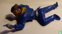 Cowboy lying with revolver (blue) - Image 1