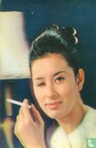 Knipogende Japanse vrouw met sigaret - Image 2