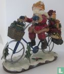 Santa Claus and woman on bicycle - Image 2