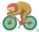 Luiaard op fiets