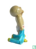 Cabbage Patch Kid avec le pouce dans la bouche
