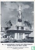 Thunderbird 3 blasts off from beneath round house on Tracy Island. - Afbeelding 1