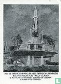Thunderbird 3 blasts off from beneath round house on Tracy Island. - Image 1