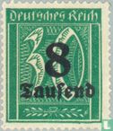 Figure in rectangle with overprint