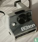 50 - SX-70 -THE BUTTON-  (text front right) - Afbeelding 1