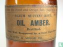 Amber bottle with "OIL AMBER" label .... - Image 1