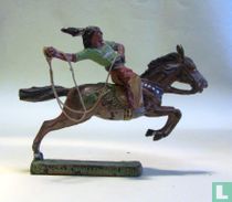 Indian on horseback with lasso