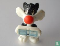 Sylvester Junior with book
