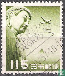 Buddha of Kamakura and DC4 aircraft