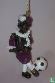 Black Peter with football