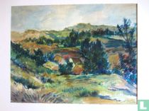 Landschaft mit Häusern in einem Tal