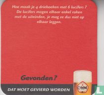 Hoe maak je 4 driehoeken met 6 lucifers ?