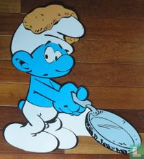 Smurf bakes pancake
