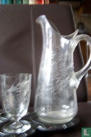 Crystal water jug with crystal glass.
