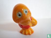 Ente mit roter Schleife
