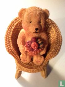 Babu with fruit basket in Chair