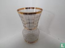 Combinatie van zandstalen, dentelle en goudafwerking