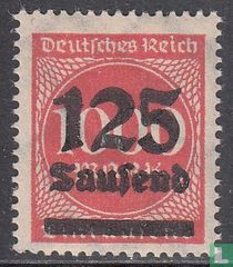 Figure in circle with overprint