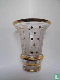 Combinatie van zandstralen,dentelle en goudafwerking