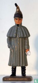 Dragonder in regenmantel 