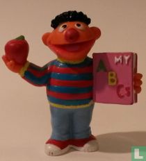 Ernie with apple and book