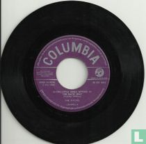 Seven Little Girls Sitting in the Back Seat