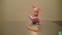 Piglet with books