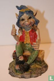 Pixie sur souche d’arbre