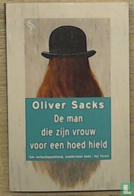 De man die zijn vrouw voor een hoed hield