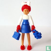 Mädchen mit Tasche und Kamera