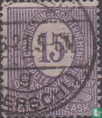Figure with trilingual inscriptions