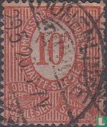 Figure with trilingual inscriptions