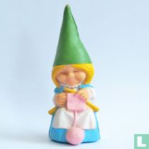 Lisa knitting [blue dress, pink knitting]
