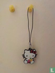 Kitty met bloemen