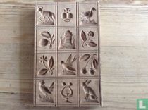 Antieke speculaasplanken en marsepeinvormen