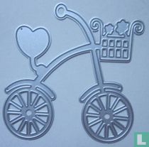 fiets met hartje aan zadel