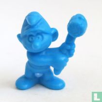 Smurf with wooden hammer