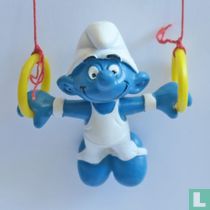 Schtroumpf gymnastique sur les anneaux