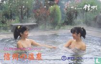 Two women talking in the hot spring
