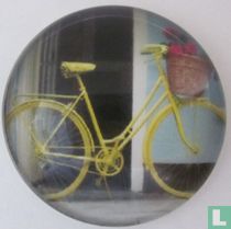 Gele damesfiets