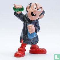 Gargamel with green test tube and blue bottle