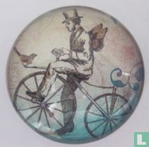 Man op ouderwetse fiets
