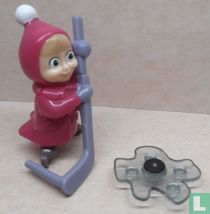 Masha avec bâton de hockey