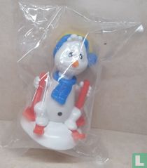 Bonhomme de neige sur les skis