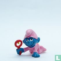  Babysmurf met rammelaar