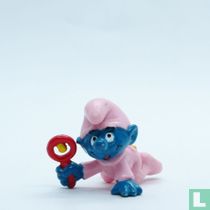 Babysmurf met rammelaar 