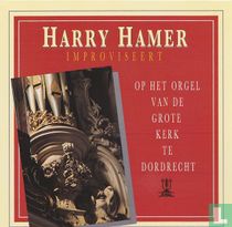 Improviseert op het orgel van de Grote Kerk te Dordrecht