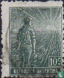 Ouvrier agricole avec soleil brillant