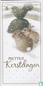 Prettige Kerstdagen: Konijnen bij struik in vogelvorm