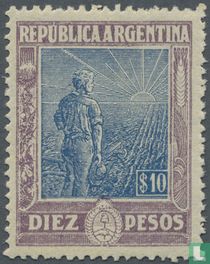 Farm workers with the bright sun